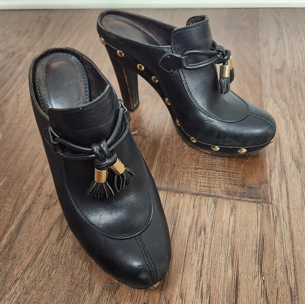 YSL studded tassel leather clogs
